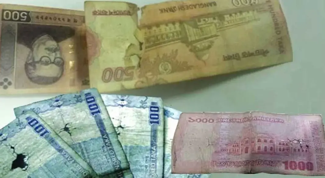 ছেঁড়া-ফাটা ও ময়লাযুক্ত নোট। ছবি : সংগৃহীত