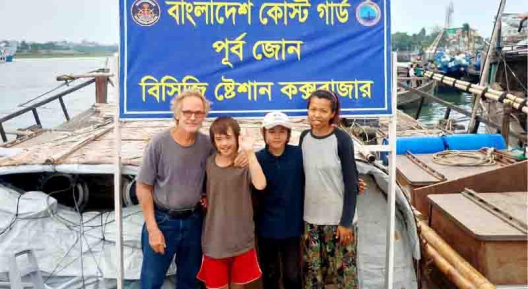 স্বপ্ন পূরণে কক্সবাজারের মহেশখালীর সোনাদিয়া চরে নৌকাসহ পুডনি ও তার পরিবারে সদস্যরা। ছবি: কোস্টগার্ডের সৌজন্যে